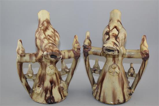 Two Yorkshire glazed red pottery figural bird whistles, second half 19th century, 25cm, restorations